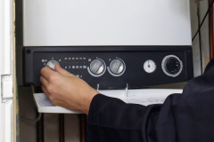 central heating repairs Raynes Park